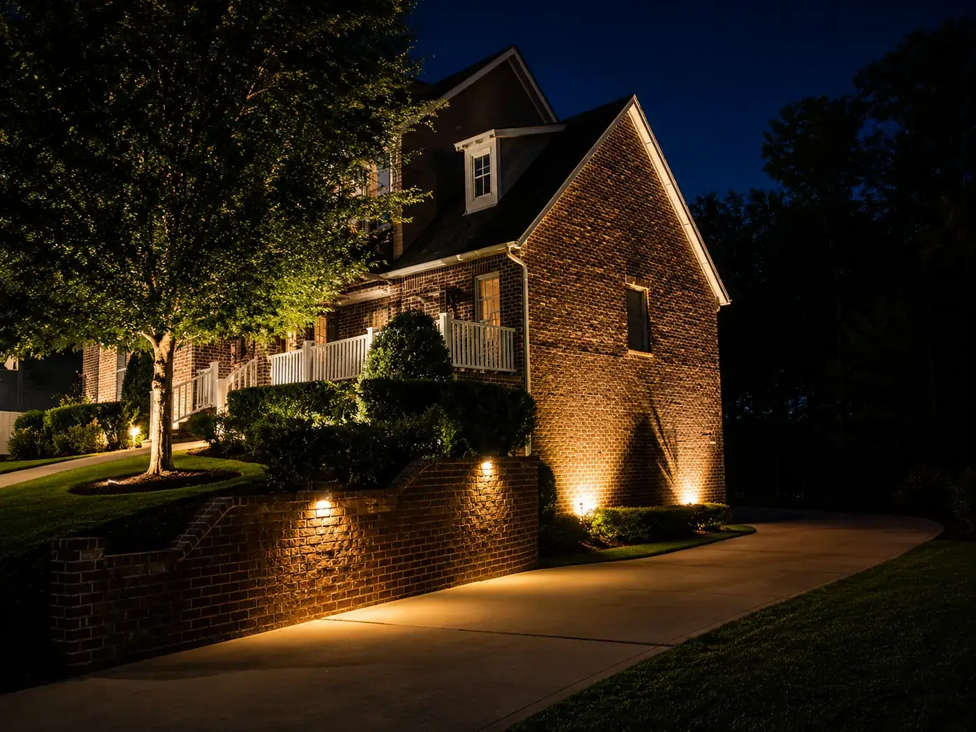 Brick home driveway and uplighting Birmingham Alabama